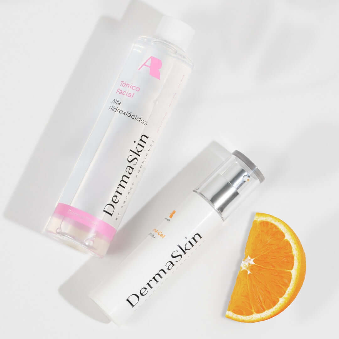 Rutina Antioxidante de AR Dermaskin con tónico facial y naranja, ideal para iluminar y proteger la piel.